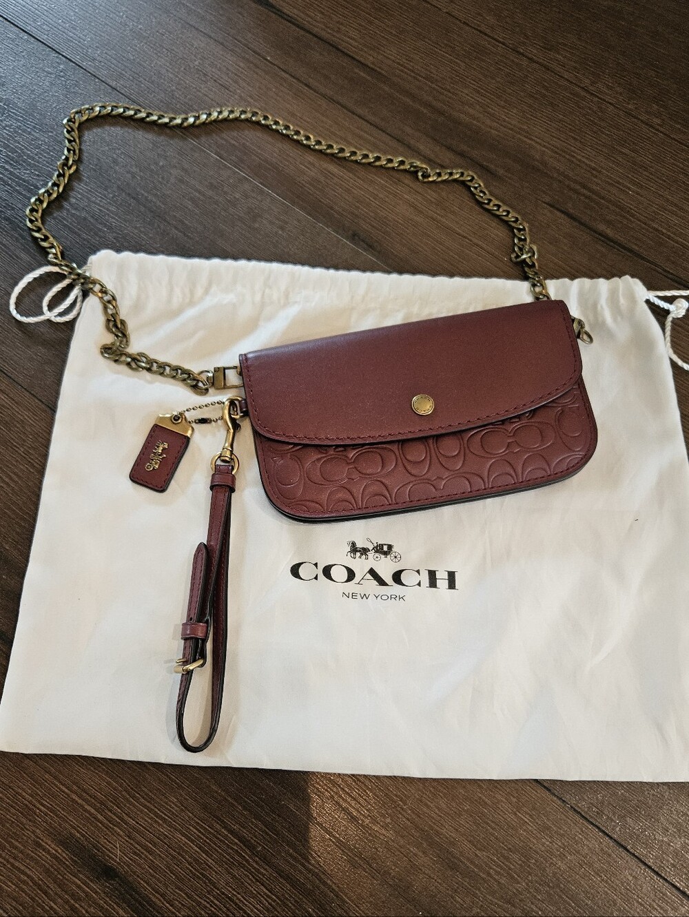 Coach Oxblood Glovetanned Leather 1941 Signature Embossed Crossbody Clutch